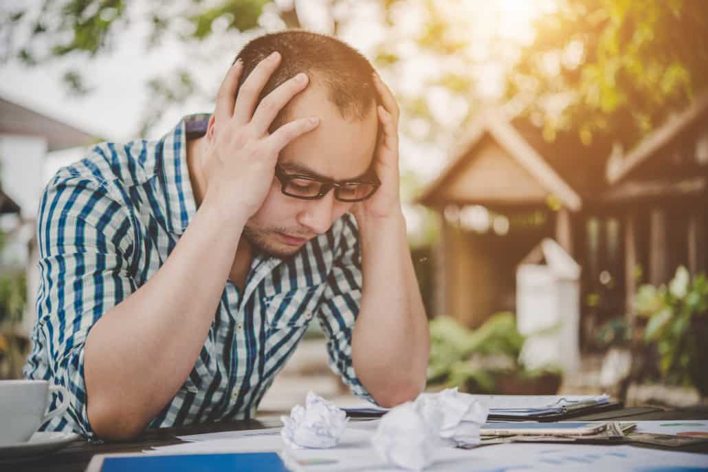 stressed businessman with papers charts sitting table home businessman with paperwork deadline concept